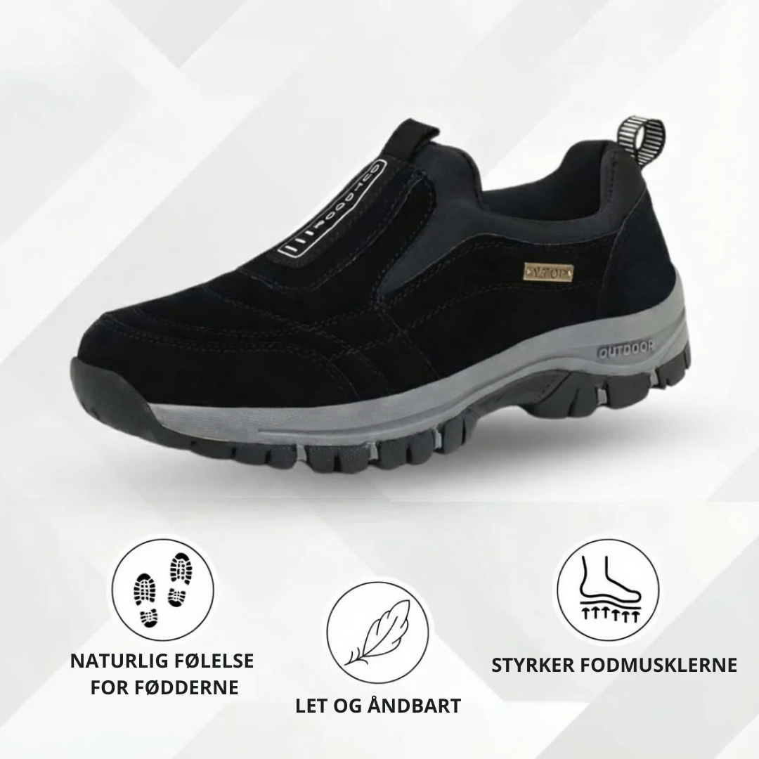 Slip-on walking shoe with stitched panels, contrast sole and deep tread