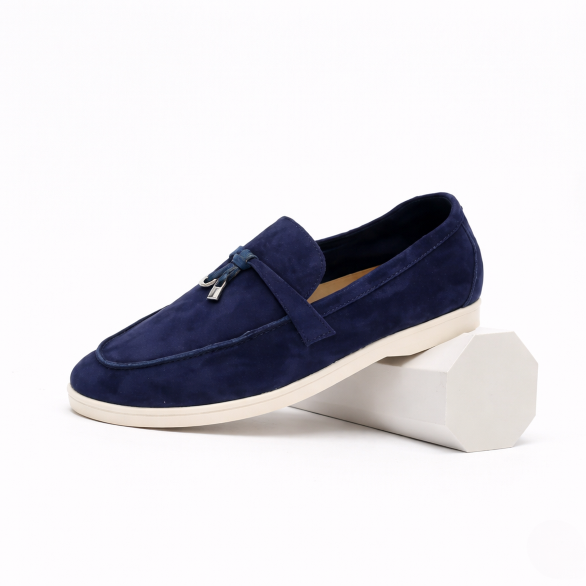 Women's slip-on loafers with metal vamp trim and flat soles