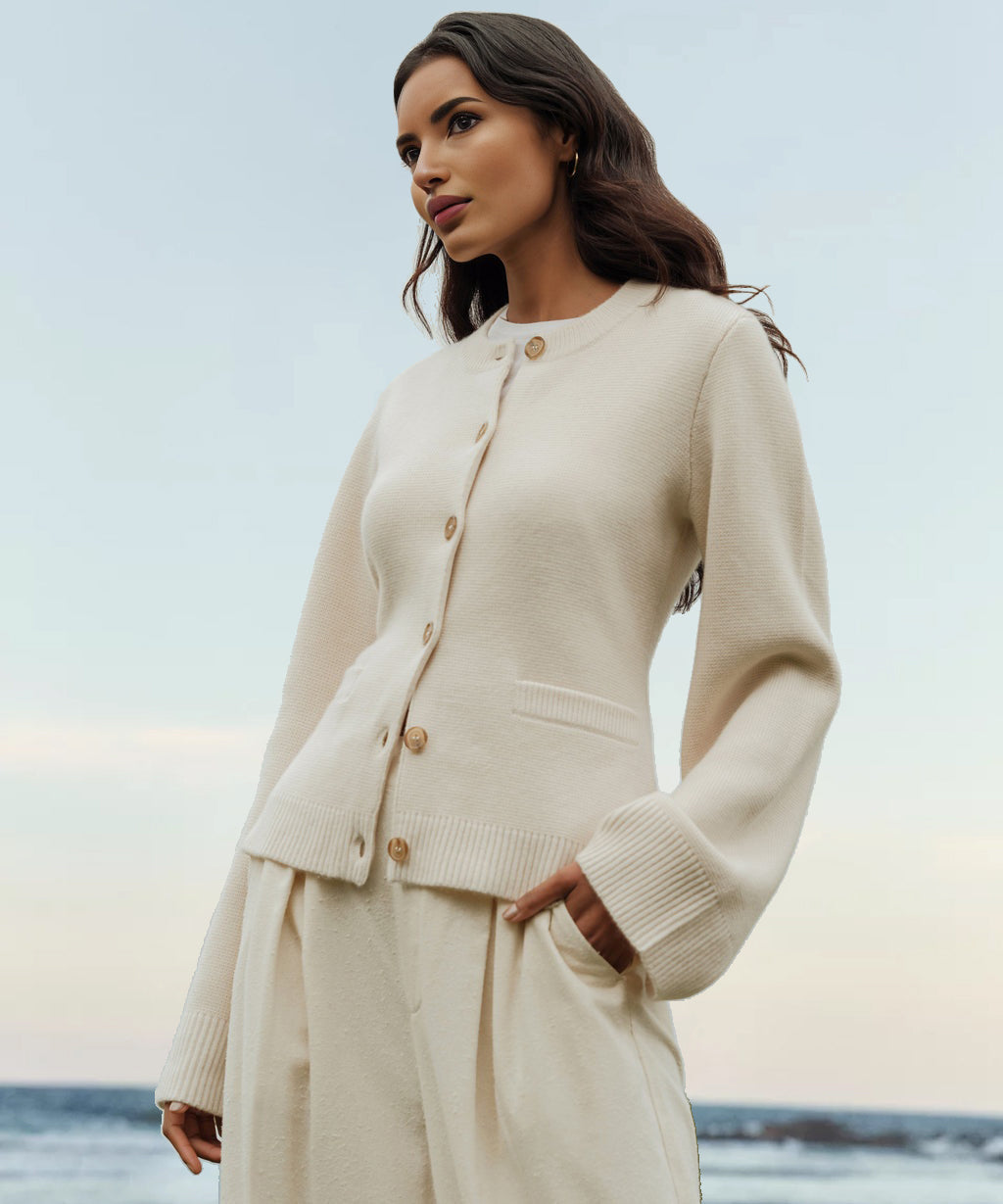 Women's button front cardigan with crew neckline, long sleeves and front pockets