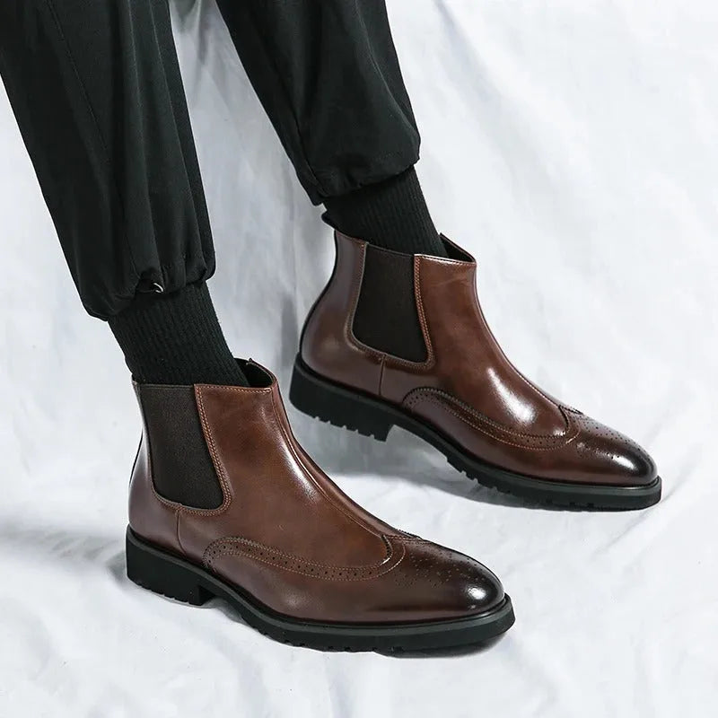 Chelsea boots with brogue detailing, elastic side panels and lug soles
