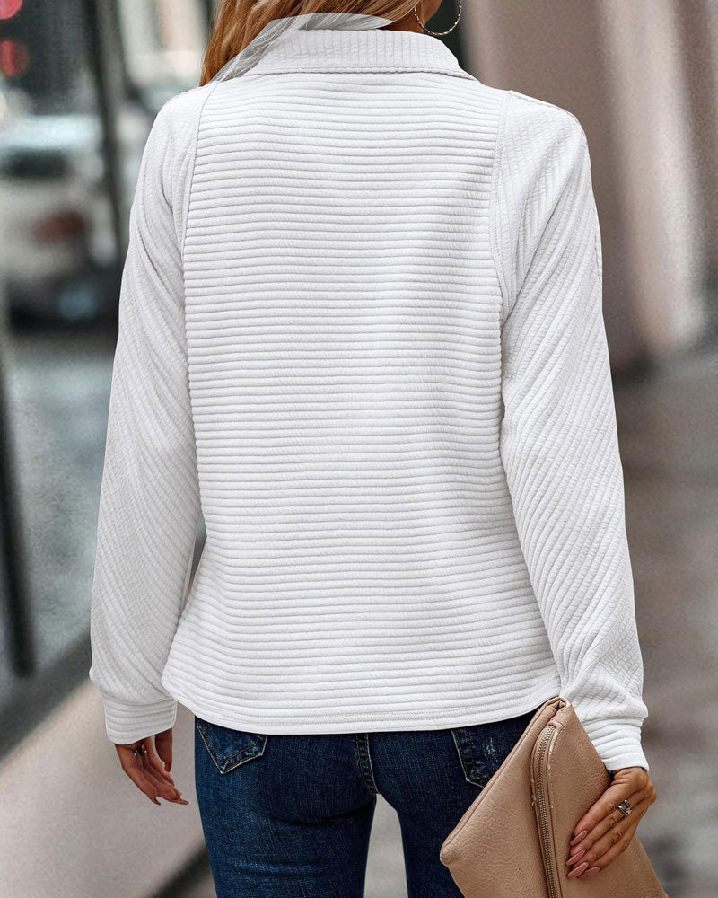 Women's ribbed quarter-zip sweatshirt with a high stand collar and long sleeves