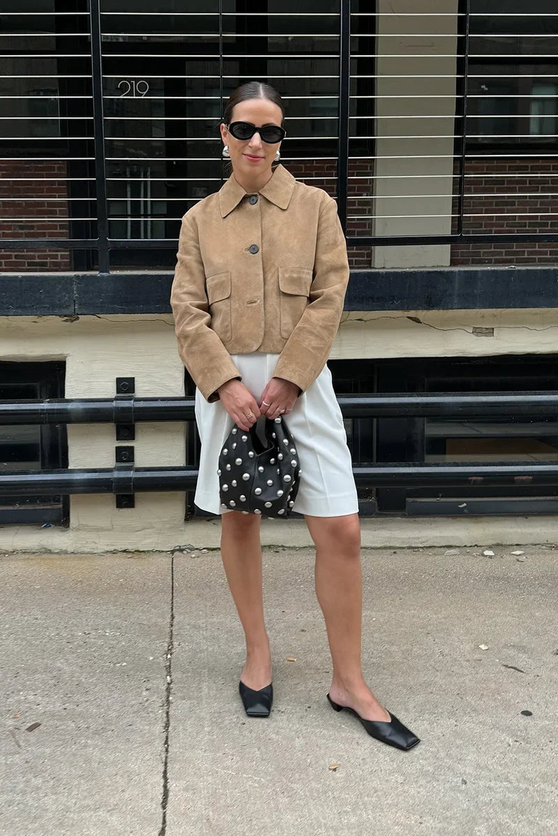 Women's sand cropped jacket with pointed collar, button front and flap pockets