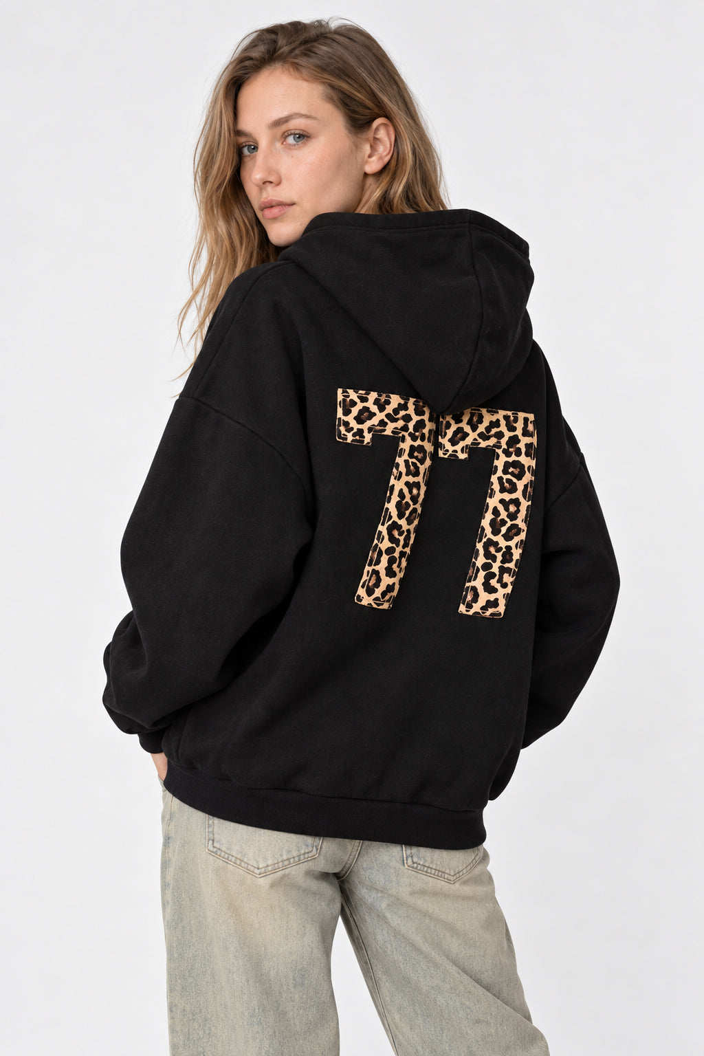Women's oversized hoodie with hood, front kangaroo pocket and bold number graphic