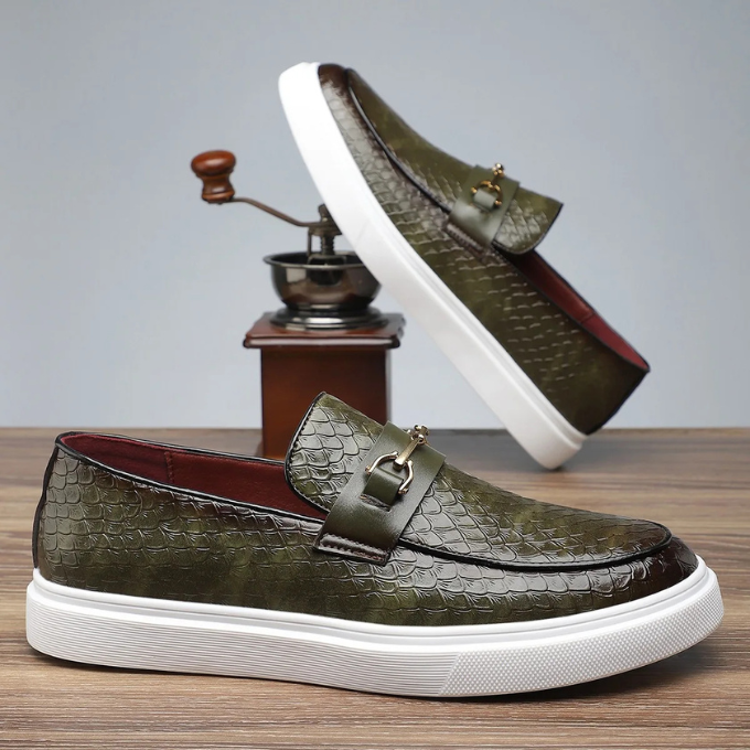 Men's textured slip-on loafers with buckle detail and contrasting flat soles