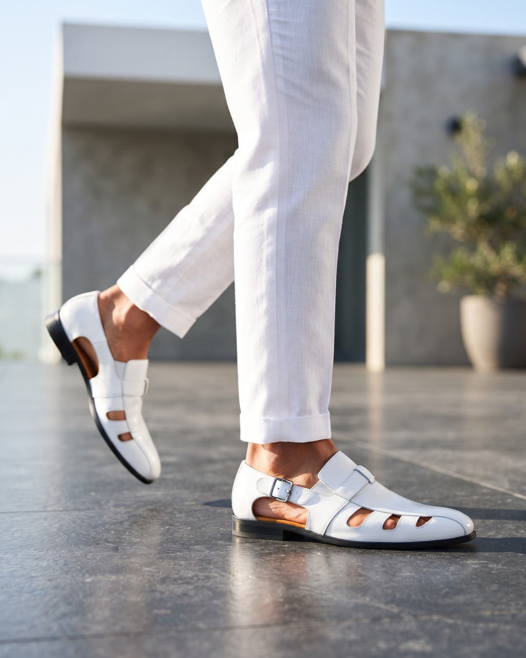 Monk strap dress loafer with cutout panels and buckle fastening