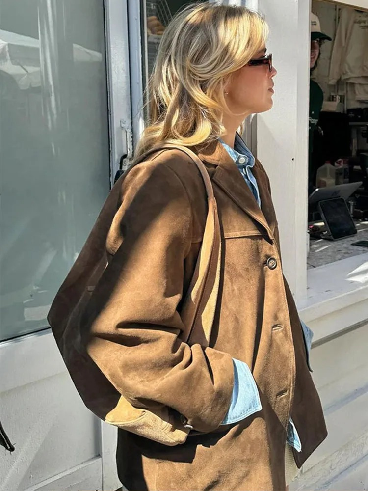 Women's brown oversized blazer jacket with notched lapels and long sleeves