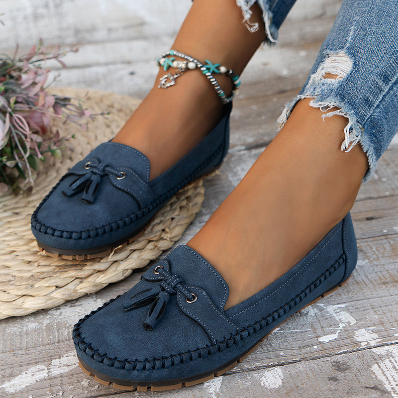 Women's moc toe loafers with lace detail and flat heels