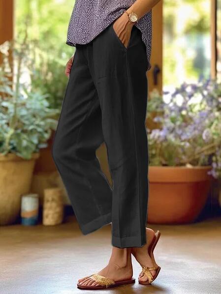 Women's cropped wide leg trousers with side pockets and cuffed hems