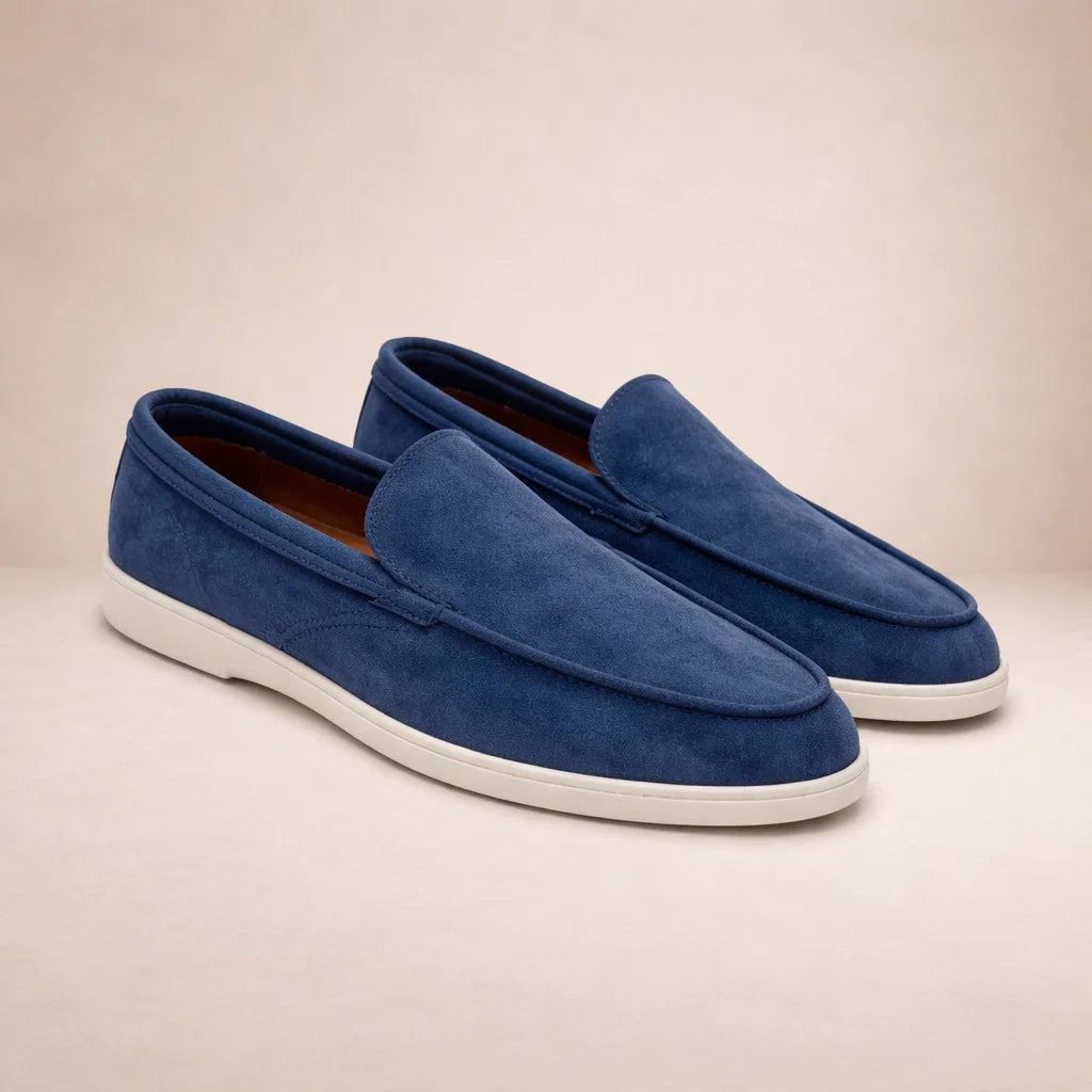 Men's slip-on moc toe loafers with stitched detail and flat light soles