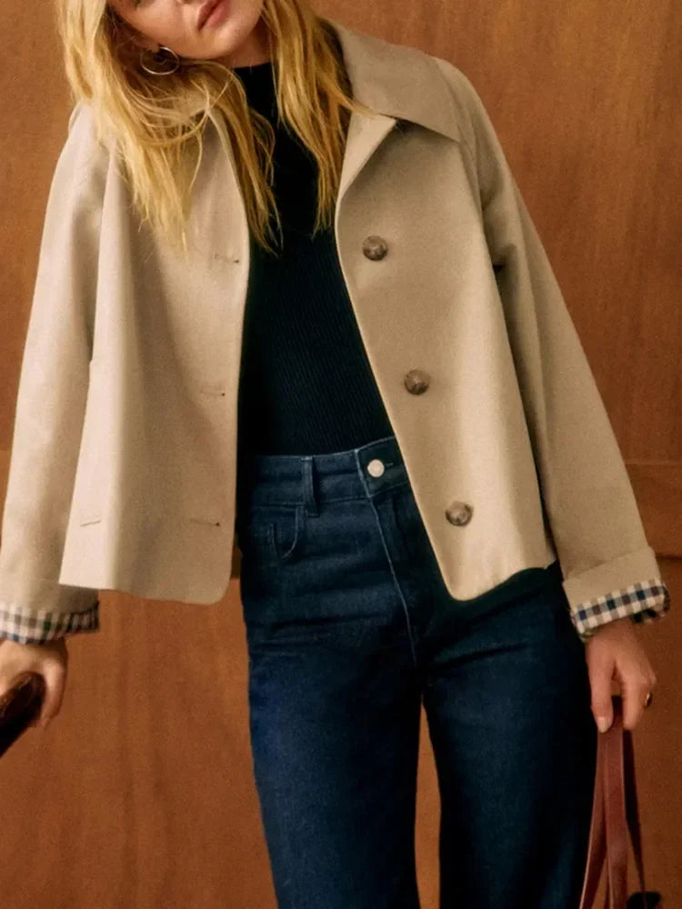 Women's beige cropped jacket with notched collar, buttons and checked cuffs