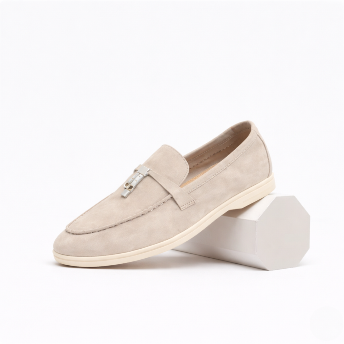 Women's slip-on loafers with metal vamp trim and flat soles