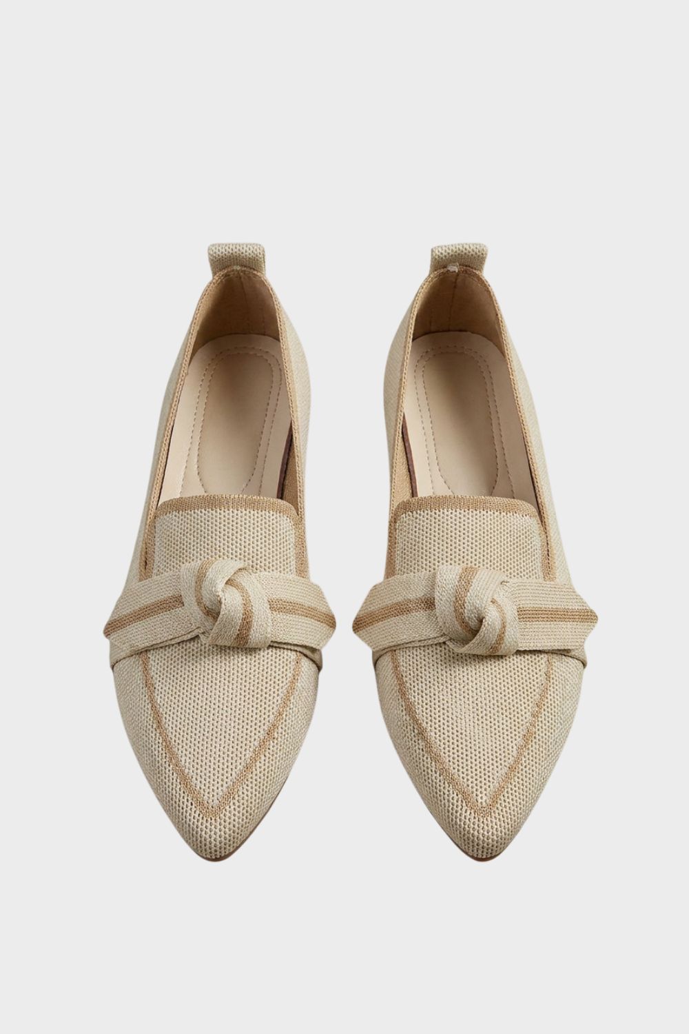 Women's pointed-toe loafers with bow trim and contrast edging