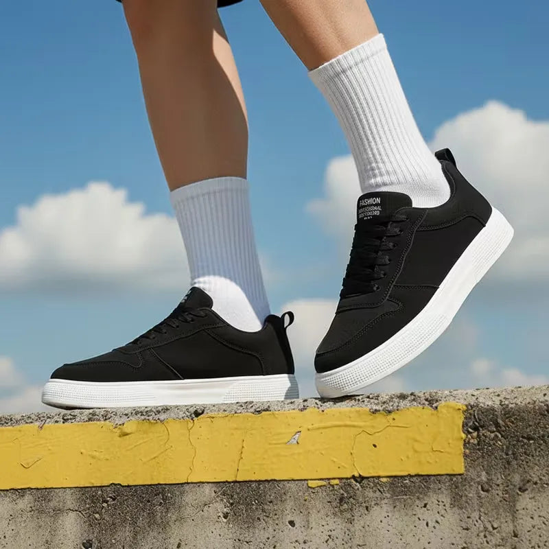 Low-top lace-up trainers with stitched panels and textured flat soles