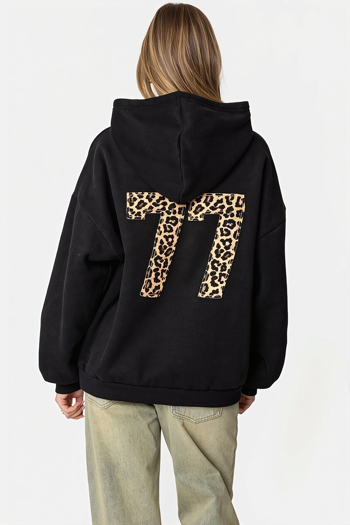 Women's oversized hooded pullover with long sleeves, pouch pocket and number graphic