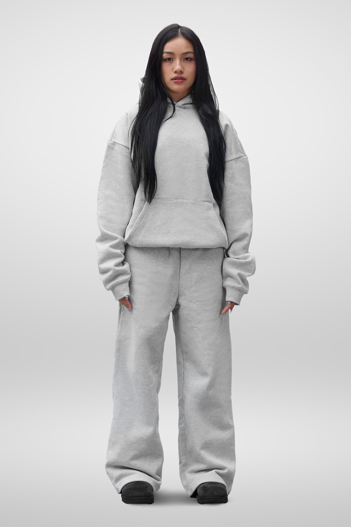Grey pullover hoodie with hood, long sleeves and front kangaroo pocket