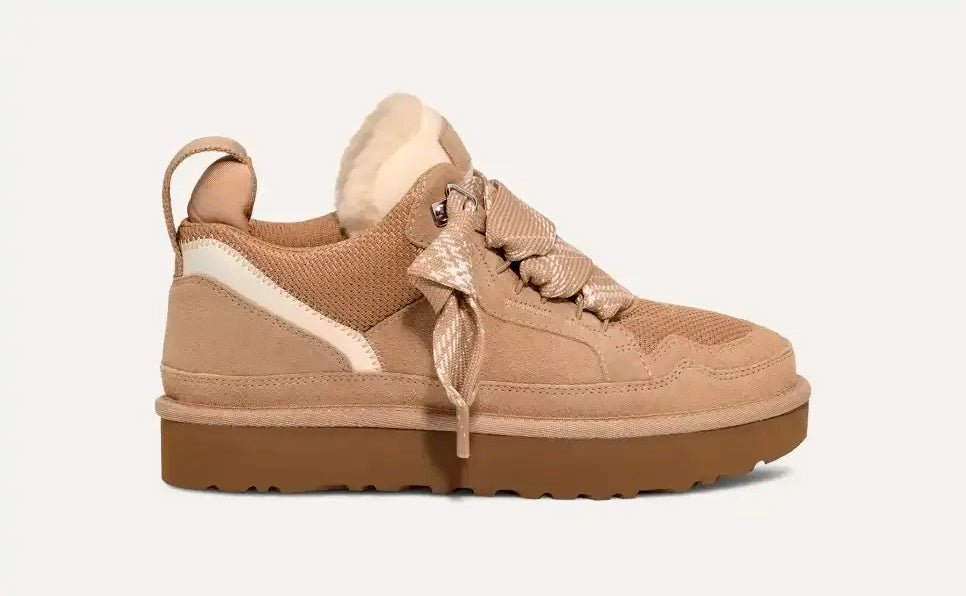 Beige women's high-top trainers with patterned laces and plush ankle trim