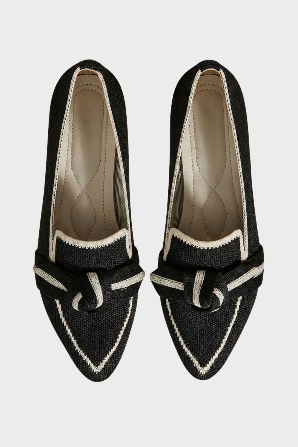 Women's pointed-toe loafers with bow trim and contrast edging