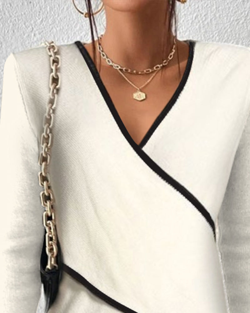 Women's white wrap jumper with long sleeves and black trim