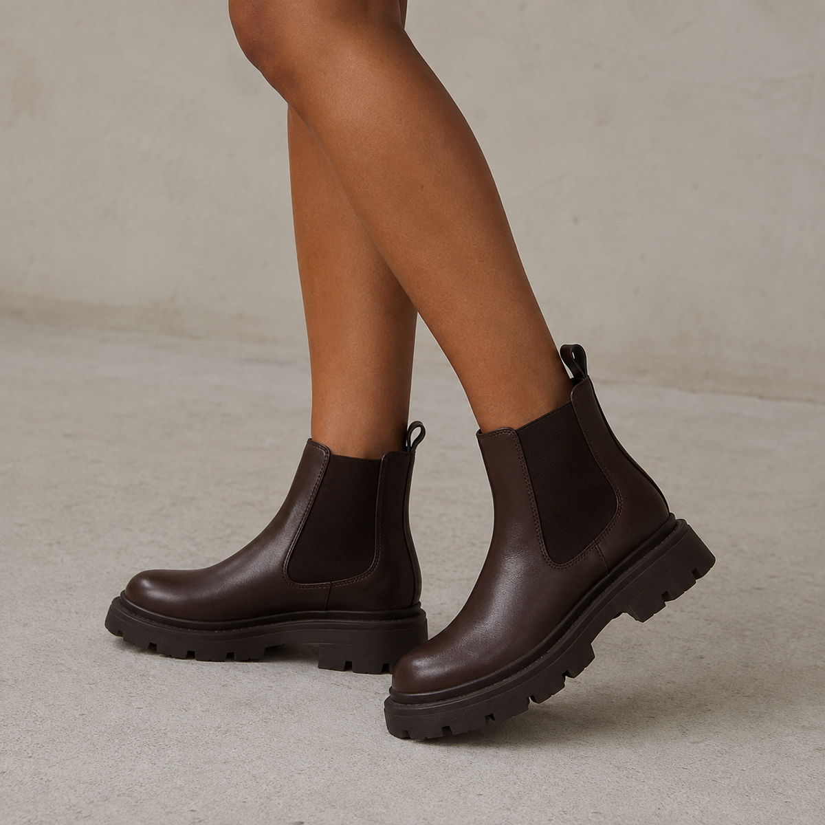 Women's Chelsea boots with elastic side panels and chunky lug soles