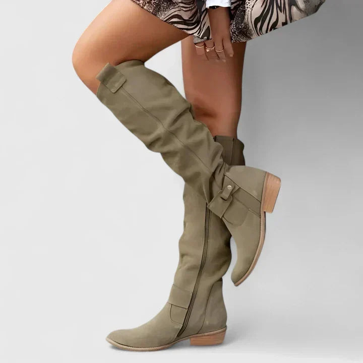 Women's slouch over-the-knee boots with low heels, side zips and strap detailing