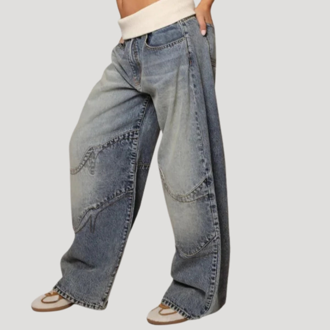 Women's light blue wide-leg jeans with curved darker panel detailing