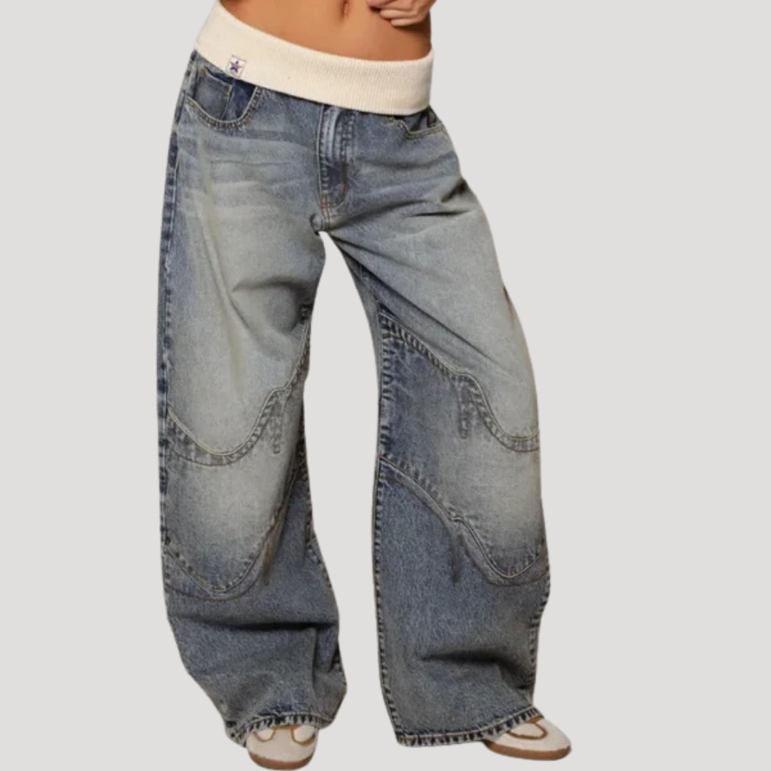 Women's light blue wide-leg jeans with curved darker panel detailing