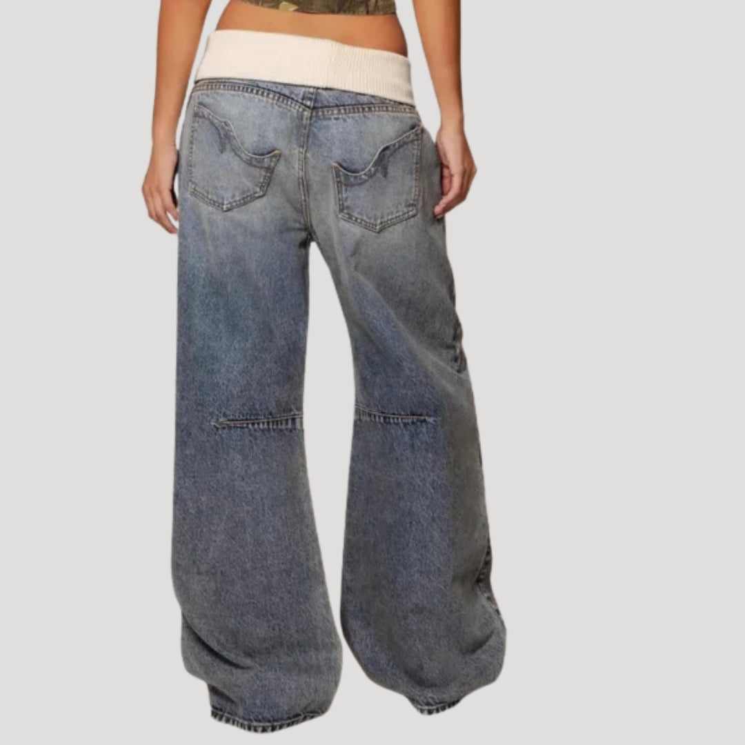 Women's light blue wide-leg jeans with curved darker panel detailing