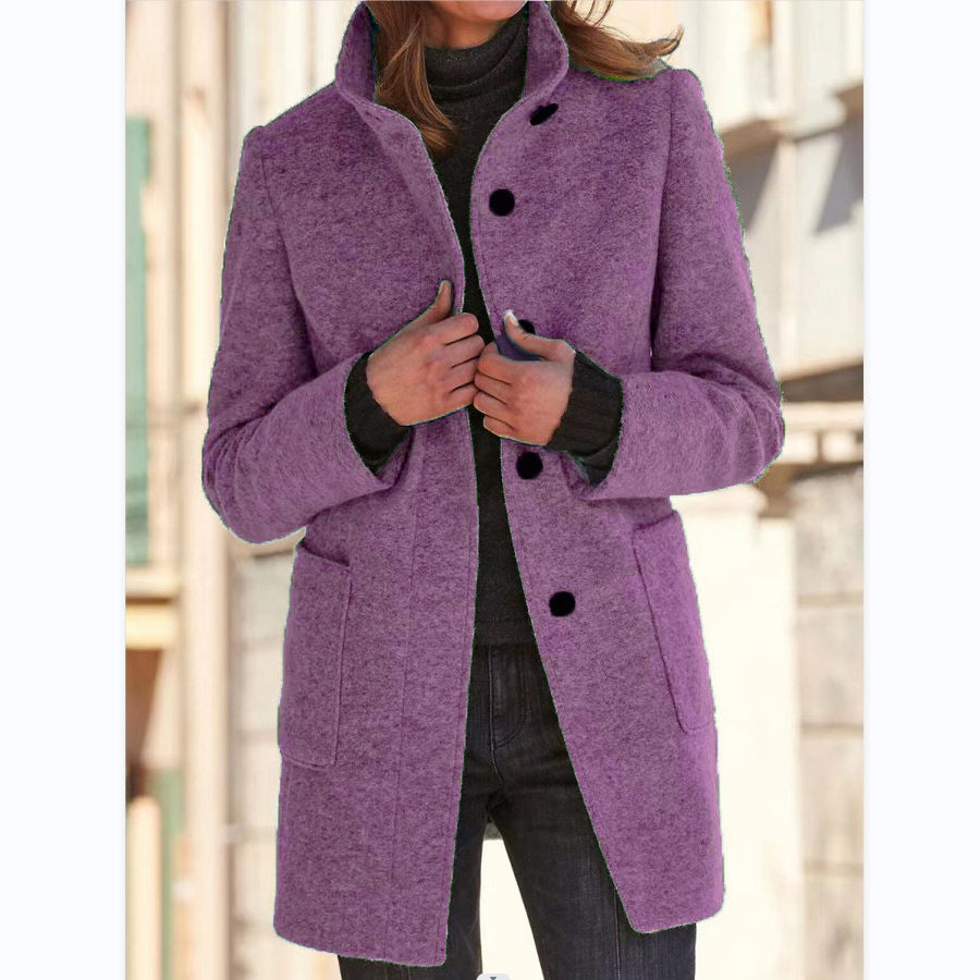 Women's high-neck button front coat with long sleeves and patch pockets