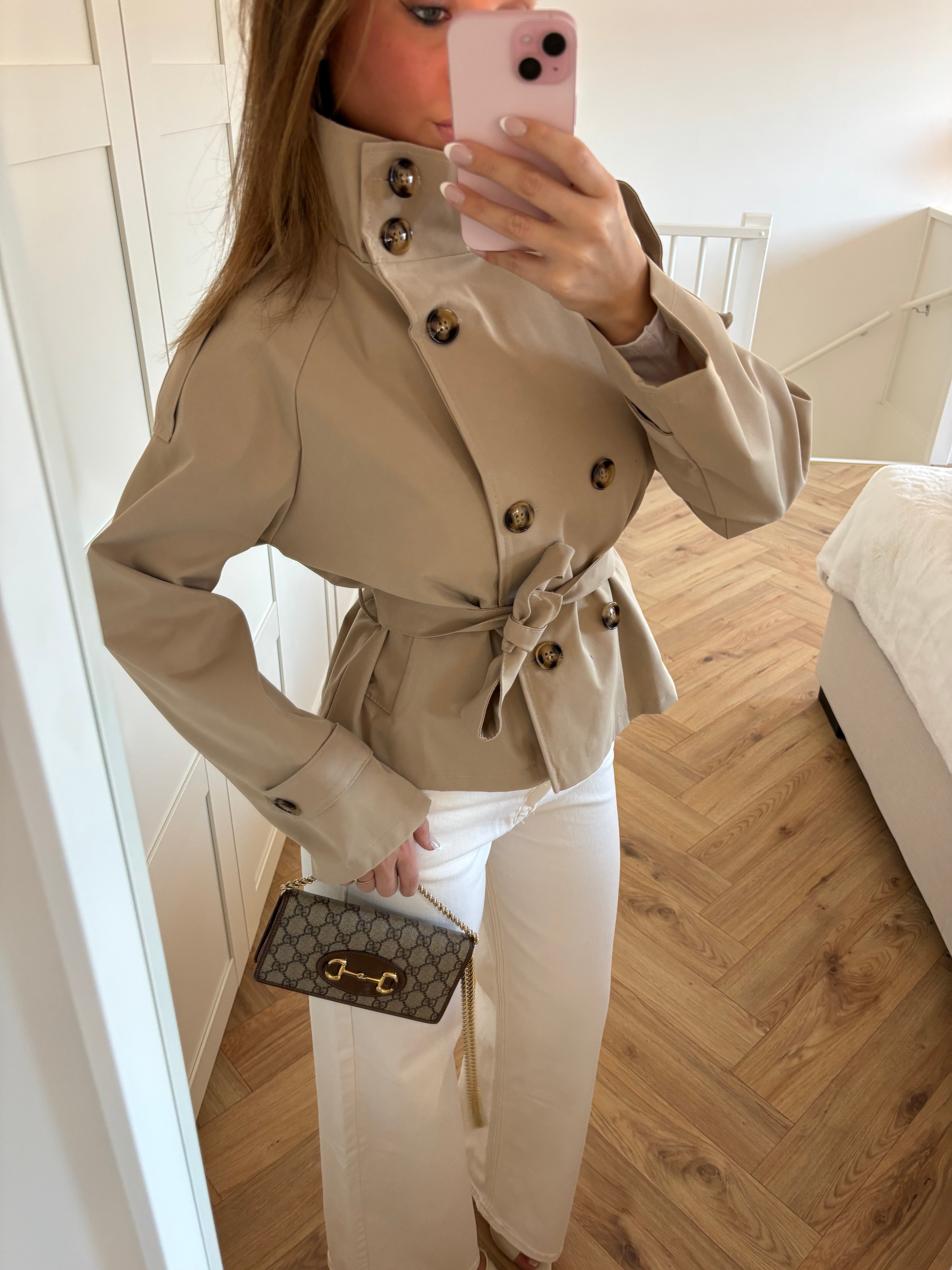 Women's beige belted trench jacket with high collar and long sleeves