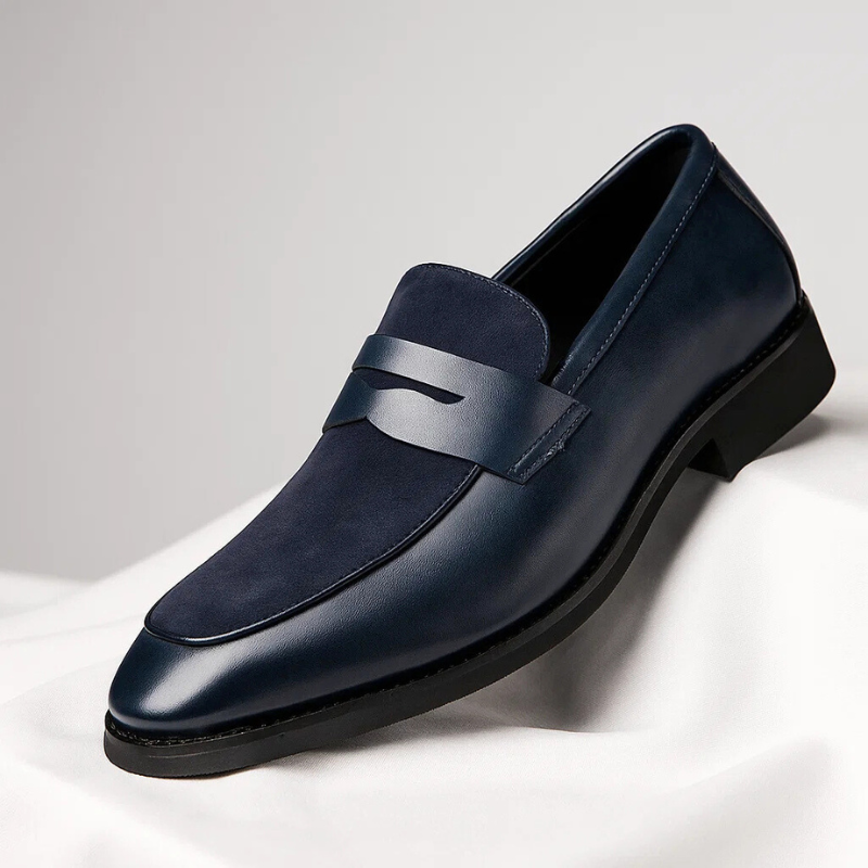 Men's penny loafer with almond toe, low heel and vamp strap