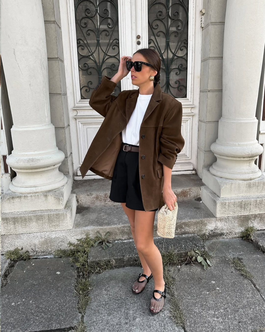 Women's brown textured blazer with notched lapels and button front