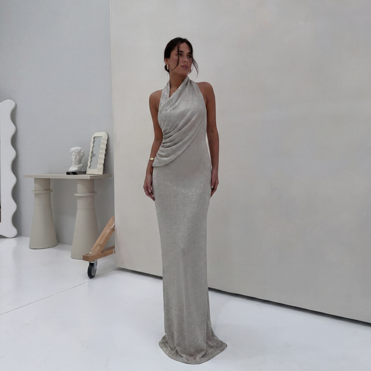 Women's silver halter wrap maxi dress with ruched waist and shimmering ribbed finish