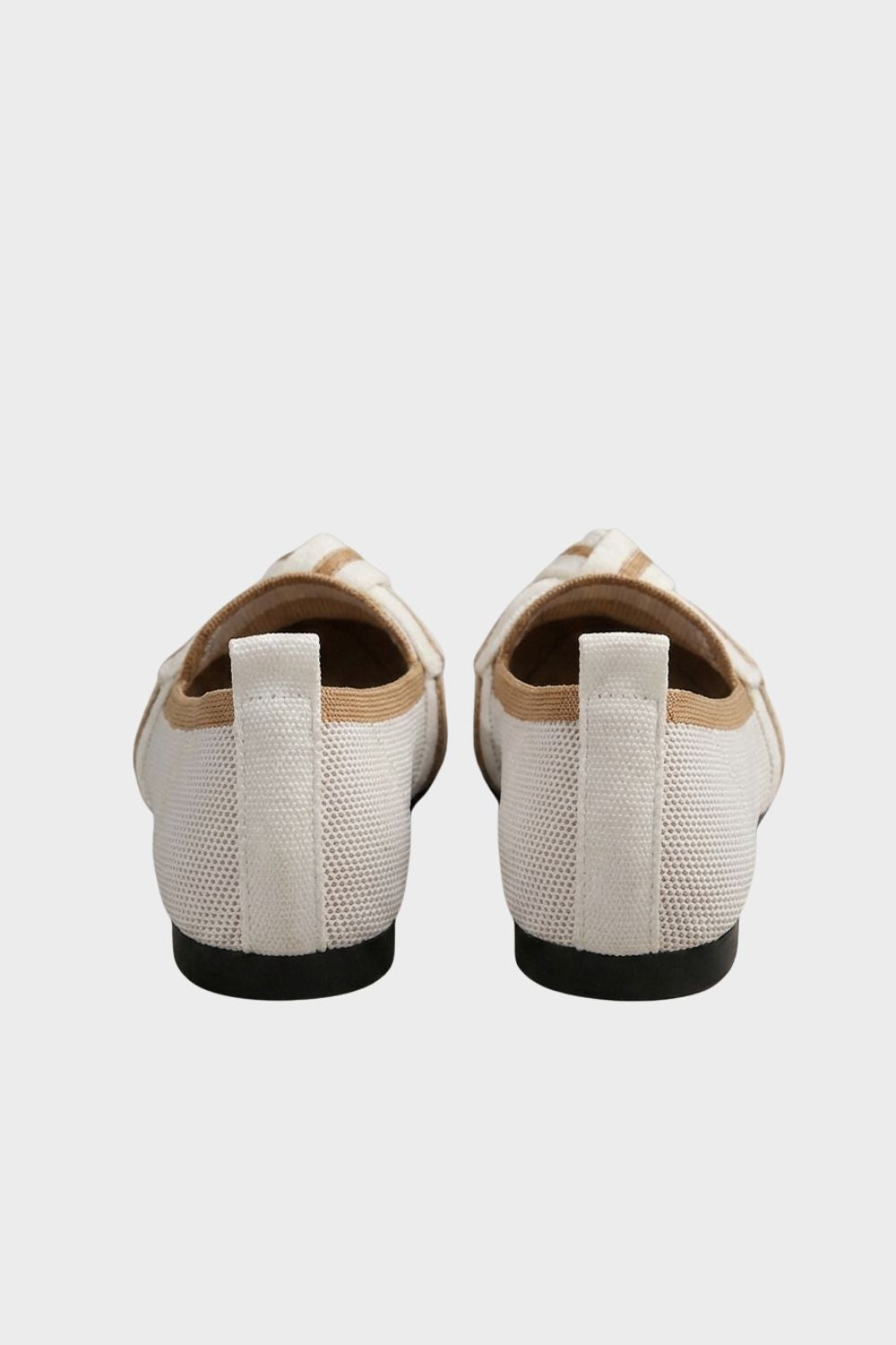 Women's pointed-toe loafers with bow trim and contrast edging