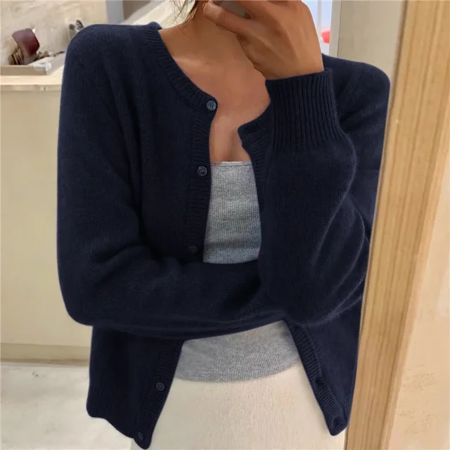 Women's relaxed button front knit cardigan with long sleeves and ribbed trims