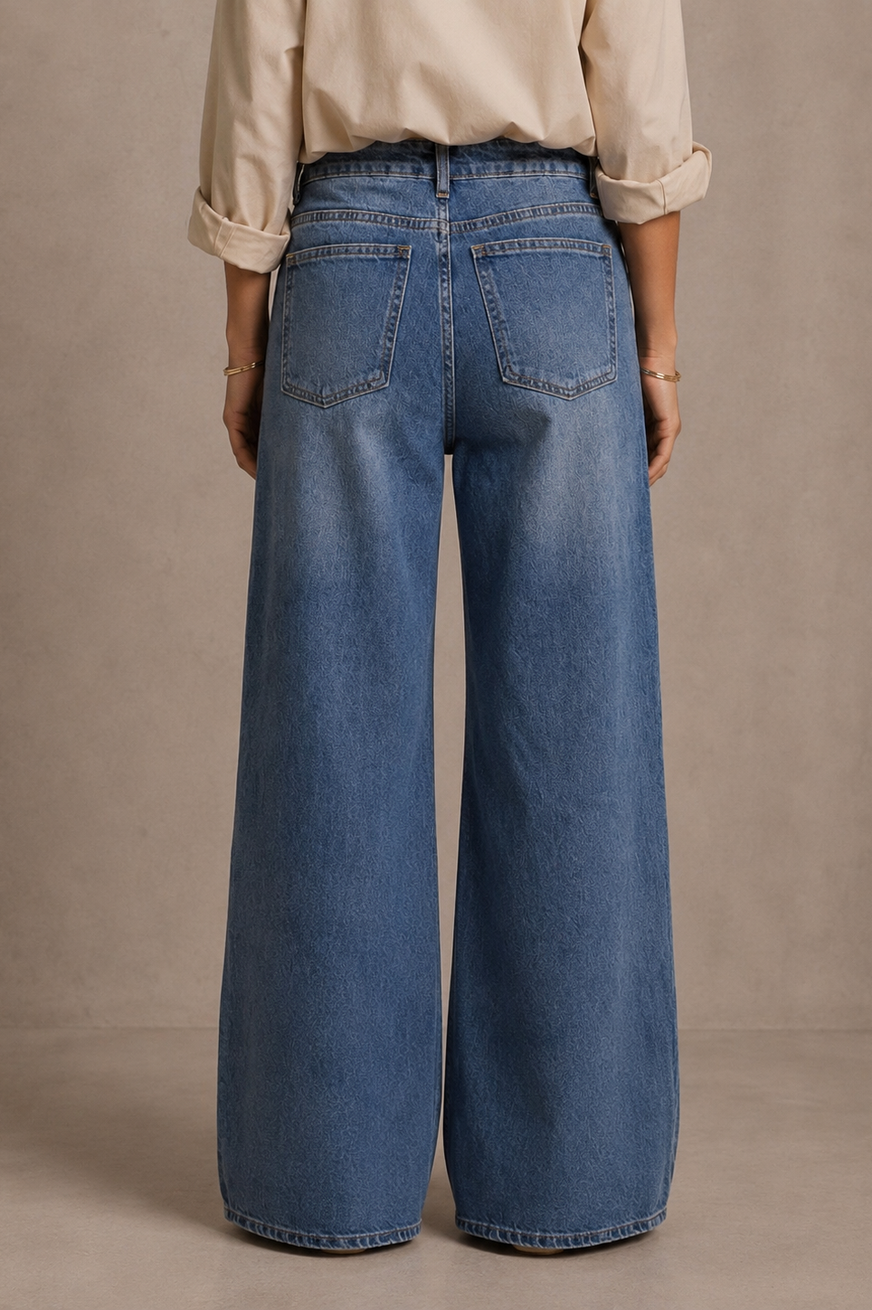 Women's blue high-rise wide-leg jeans with braided pocket trim