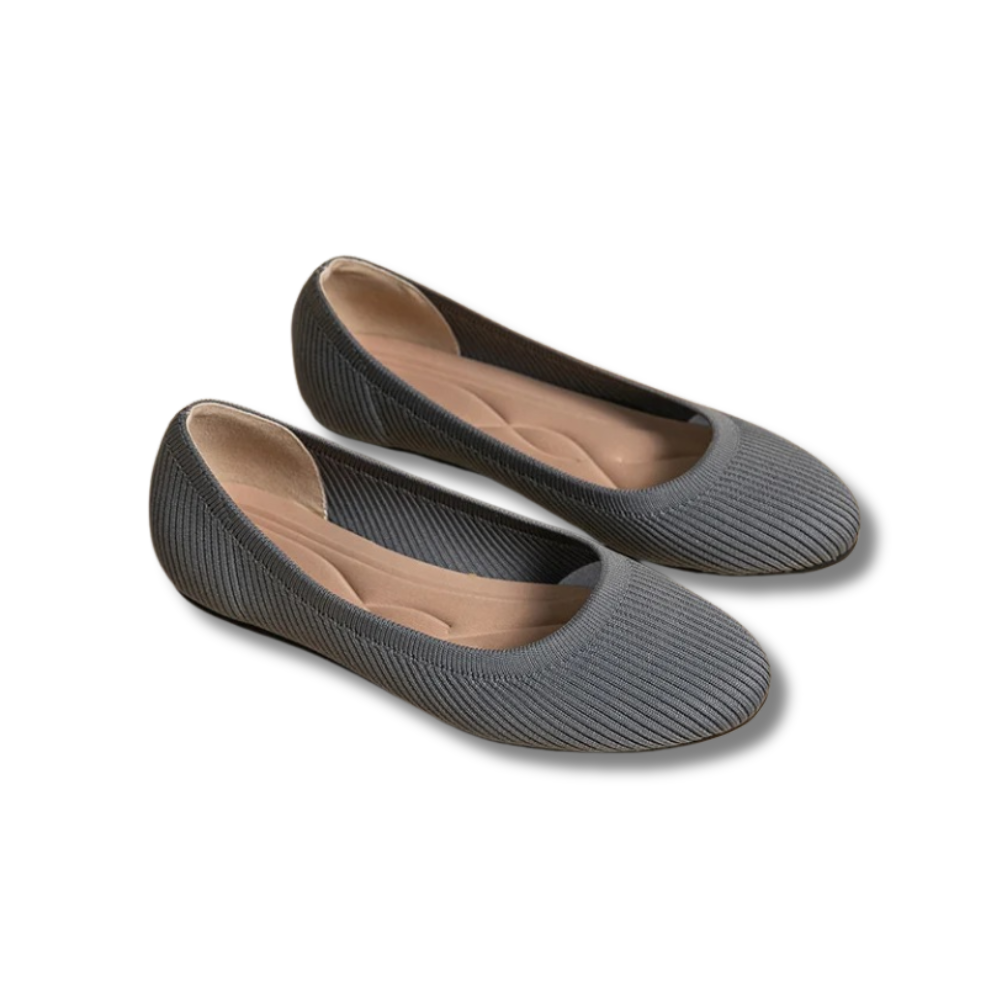 Women's ribbed ballet flats with rounded toes and contoured insoles