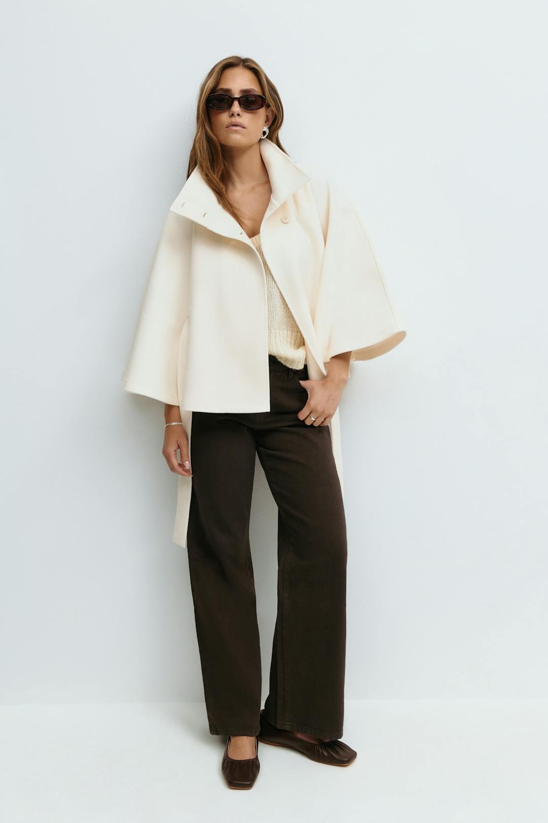 Women's short belted jacket with high collar, button front and wide sleeves