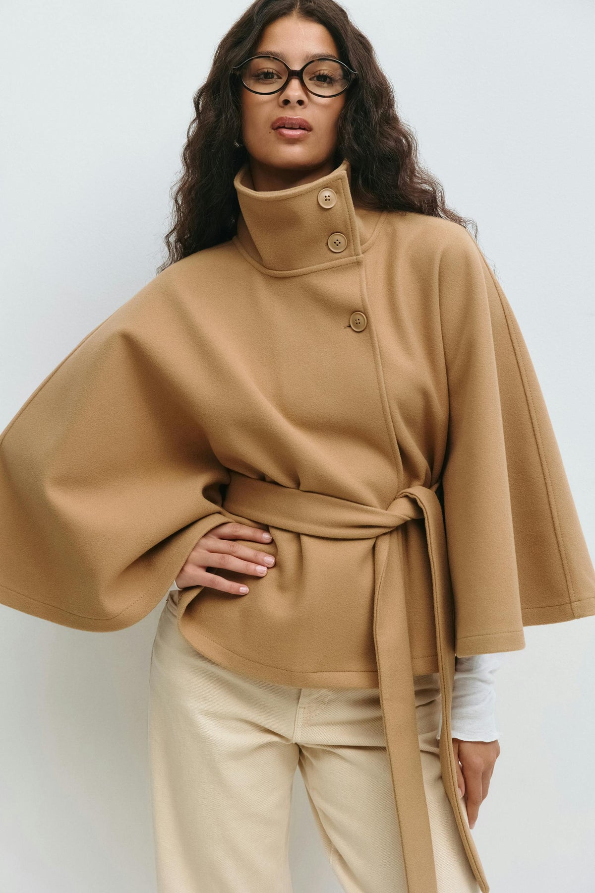 Women's short belted jacket with high collar, button front and wide sleeves