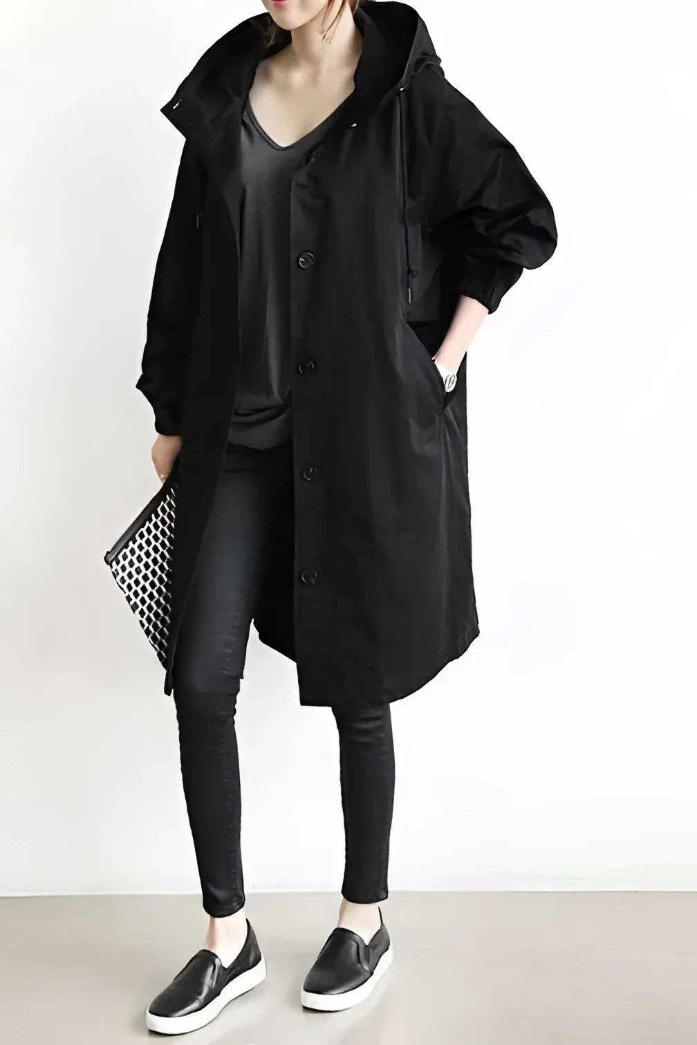 Women's longline hooded trench coat with button front and gathered sleeves