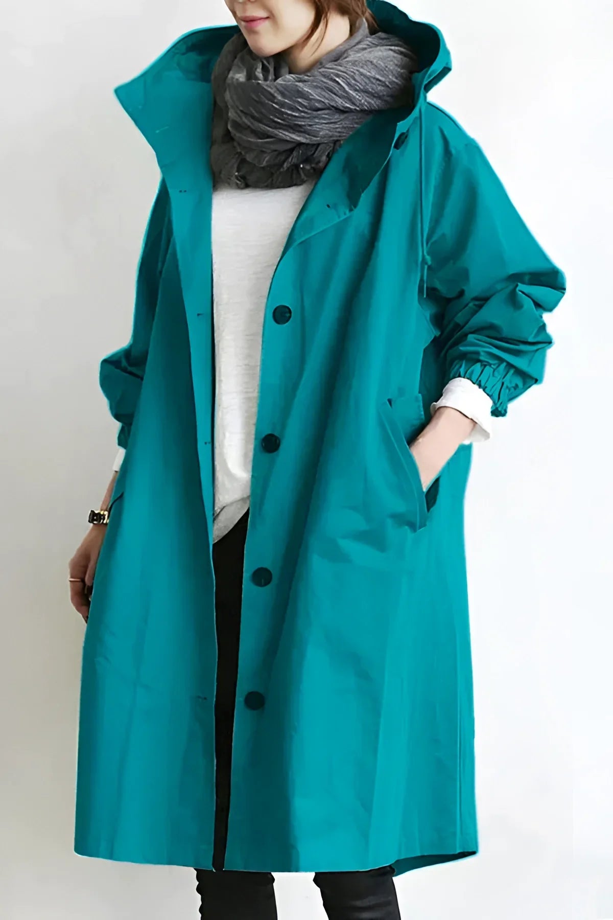 Women's longline hooded trench coat with button front and gathered sleeves