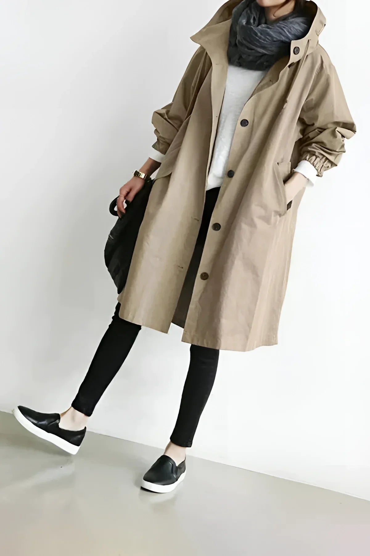 Women's longline hooded trench coat with button front and gathered sleeves