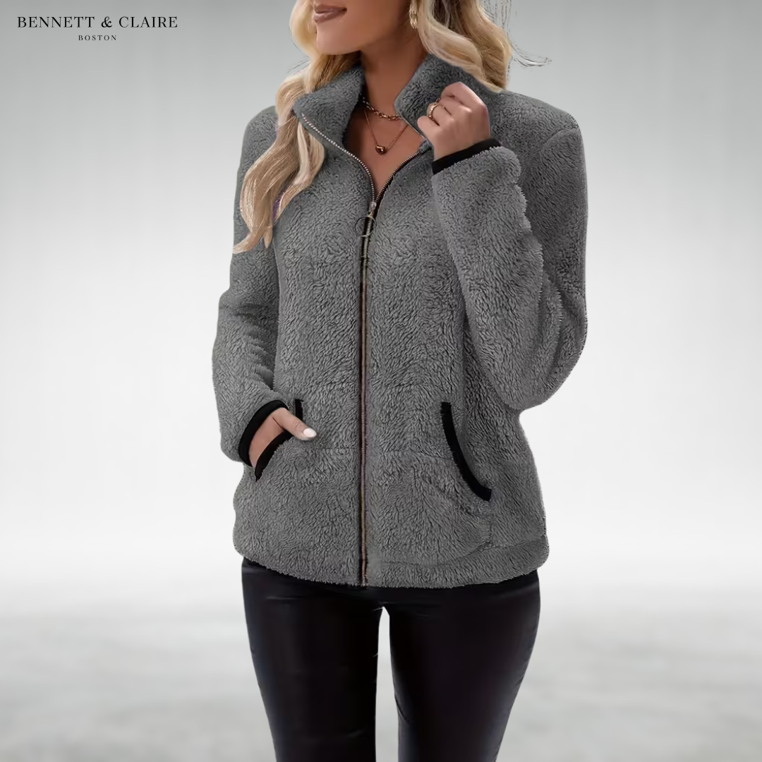 Women's textured fleece jacket with raised collar, zip front and black-trimmed pockets