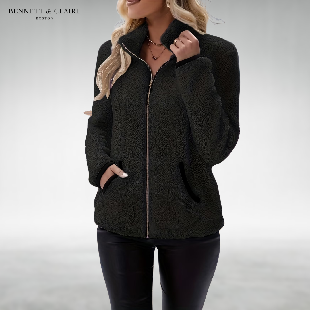 Women's textured fleece jacket with raised collar, zip front and black-trimmed pockets
