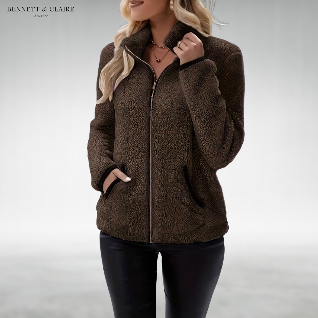 Women's textured fleece jacket with raised collar, zip front and black-trimmed pockets