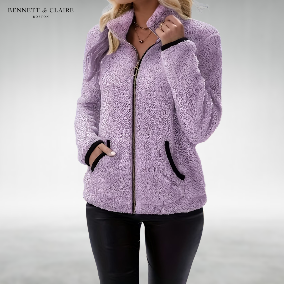 Women's textured fleece jacket with raised collar, zip front and black-trimmed pockets