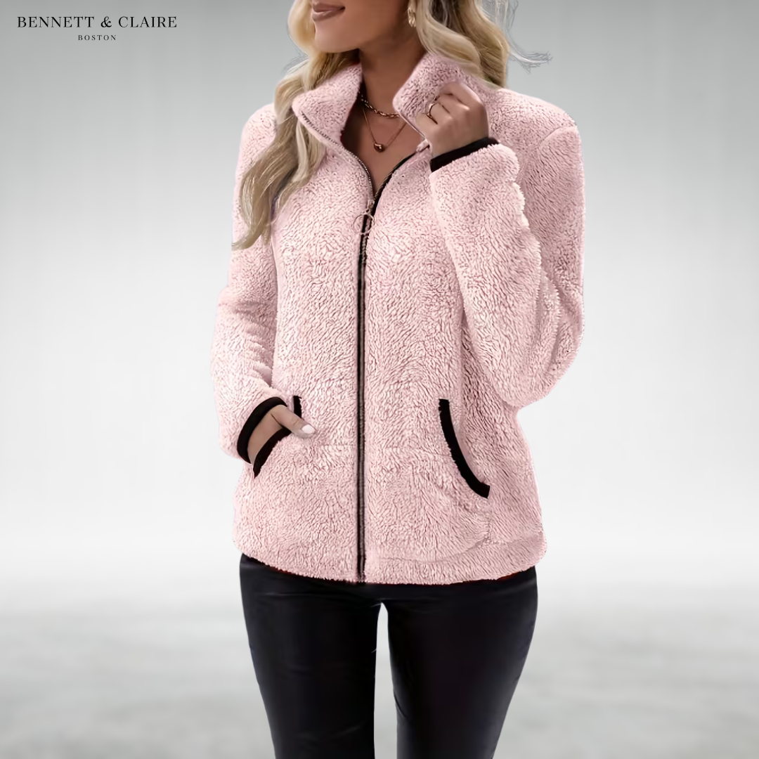 Women's textured fleece jacket with raised collar, zip front and black-trimmed pockets