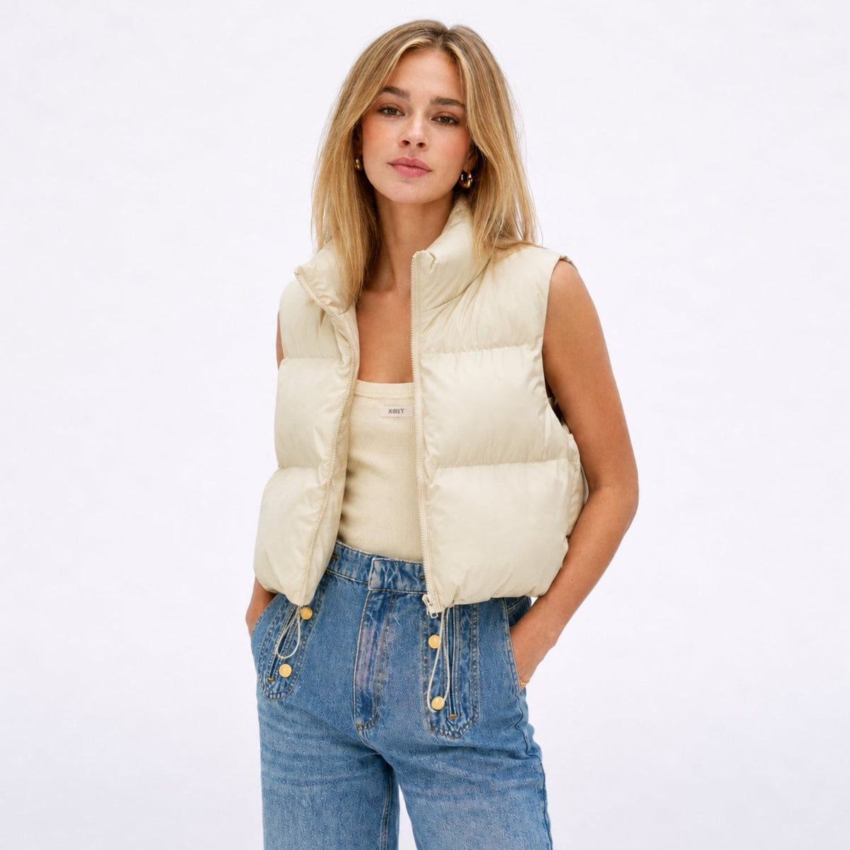 Women's cropped quilted puffer vest with high collar and zip front