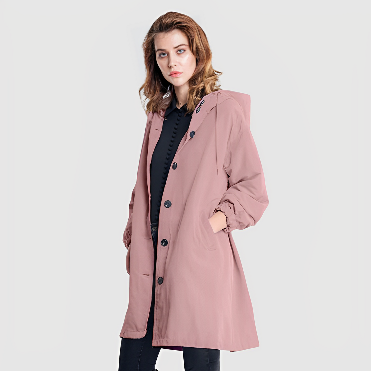 Women's longline hooded button-front rain jacket with side pockets