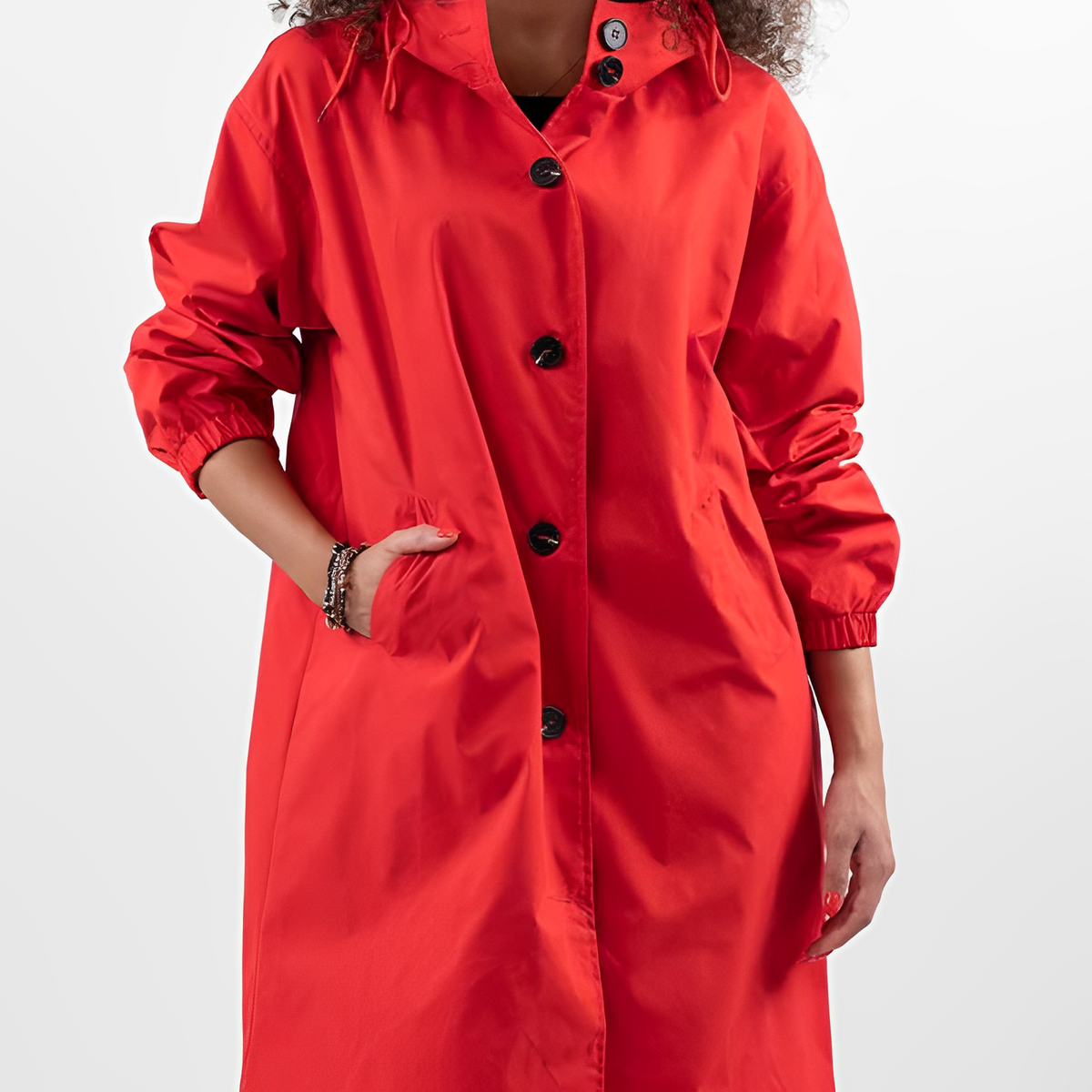 Women's longline hooded button-front rain jacket with side pockets