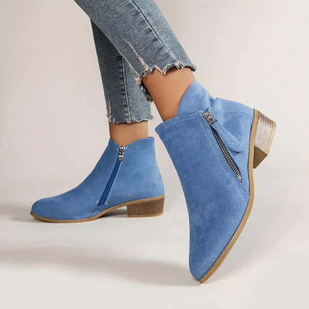 Women's ankle boots with side zip and low block heel